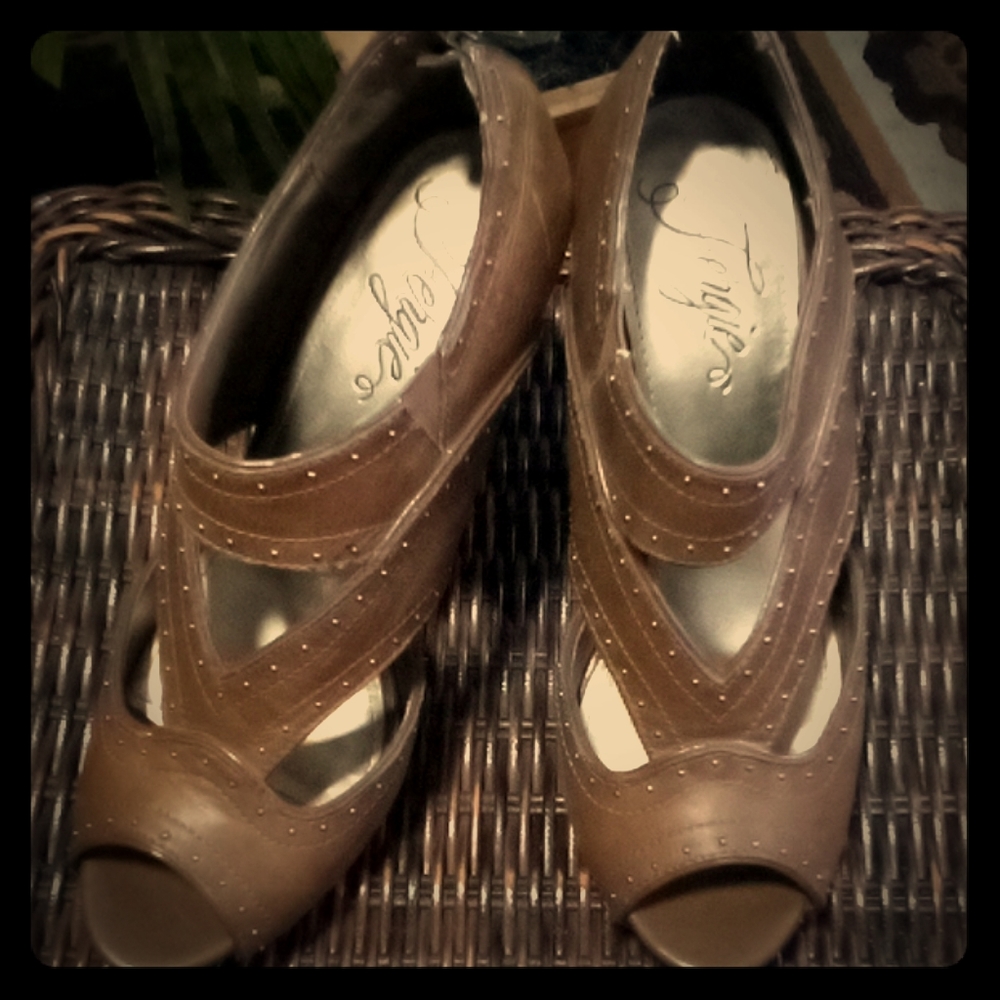 Pair size 8 of "Fergie" studded  high heels